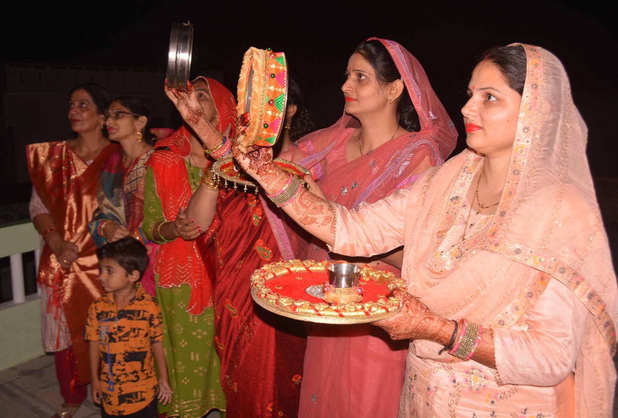 Suhagins keep fast, wish for husband's long life