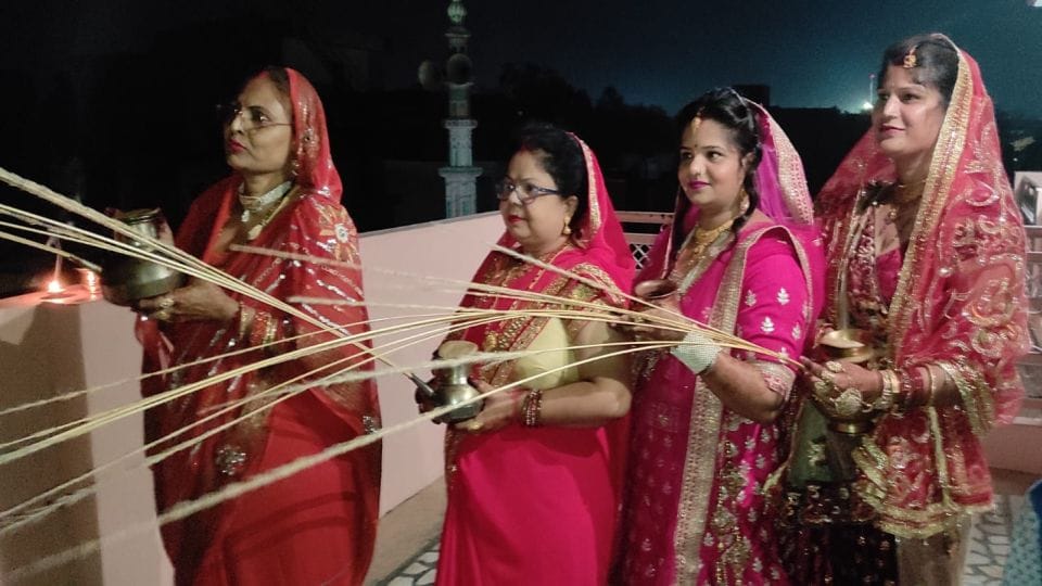 Karwa Chauth women seeing the moon and wish for husband long life in etah kasganj