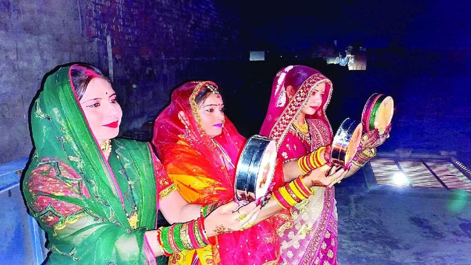 Karwa Chauth women seeing the moon and wish for husband long life in etah kasganj