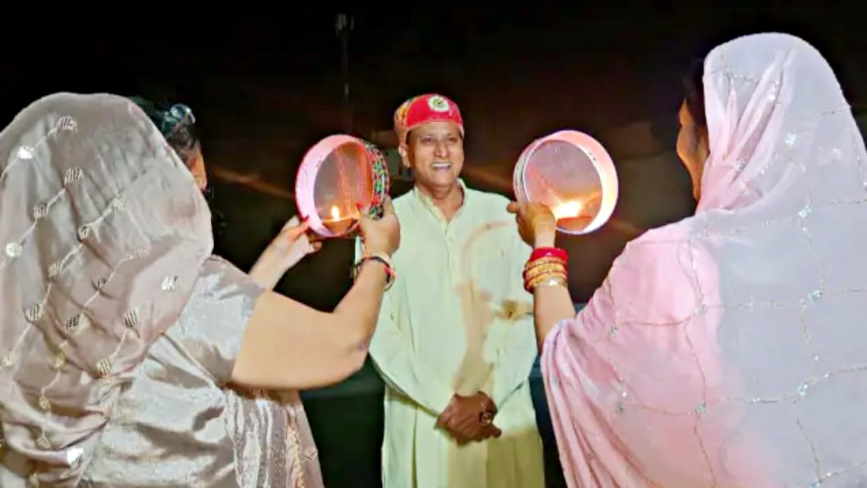 bjp mp arjunlal meena celebrates karva chauth with his two wives