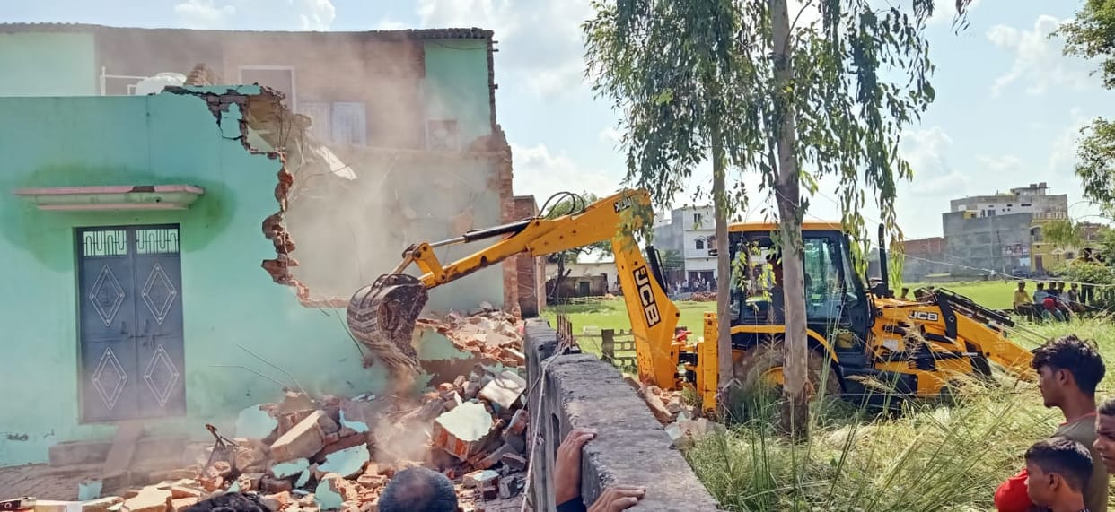 Demolition of the encroachment on the cemetery