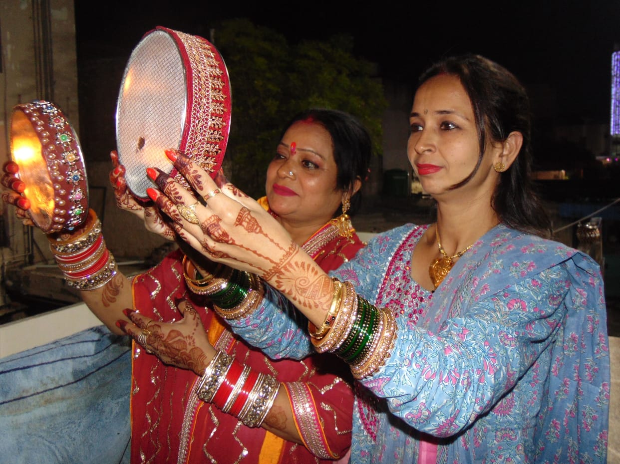 After doing sixteen make-up, the suhagins asked Chandradev for the long life of the suhag.