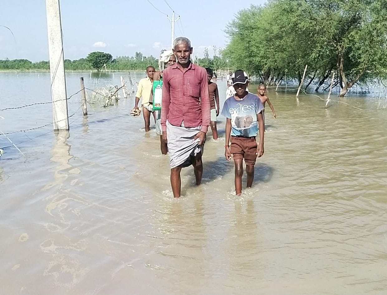 Villagers trapped in flood, not getting help