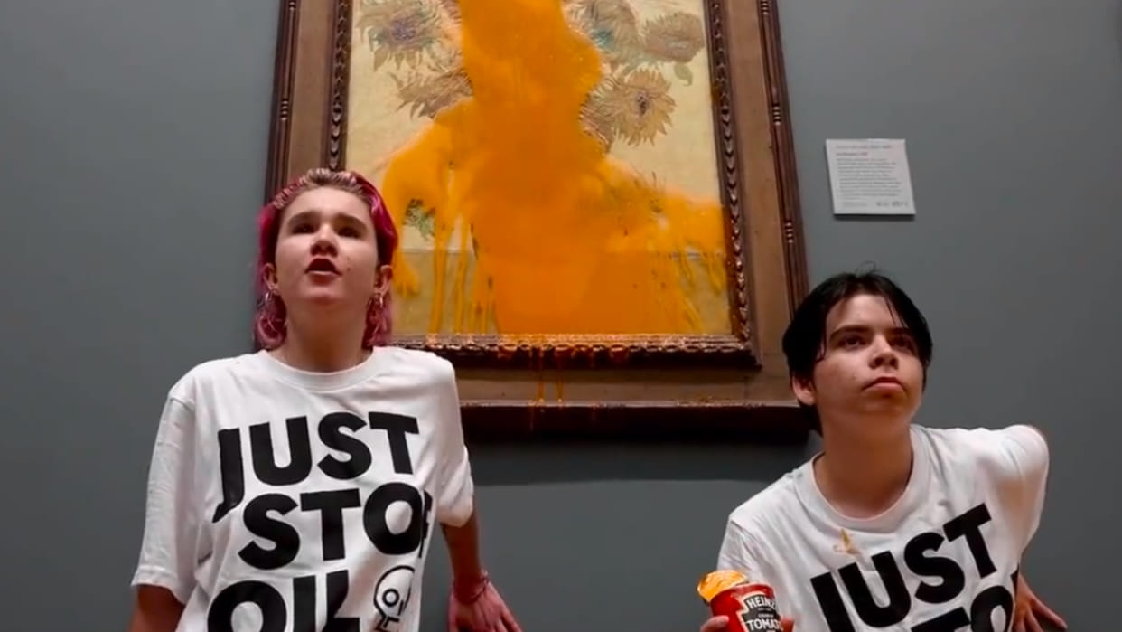 Two girls throw soup on Van Goghs famous Sunflowers painting in national gallerry london