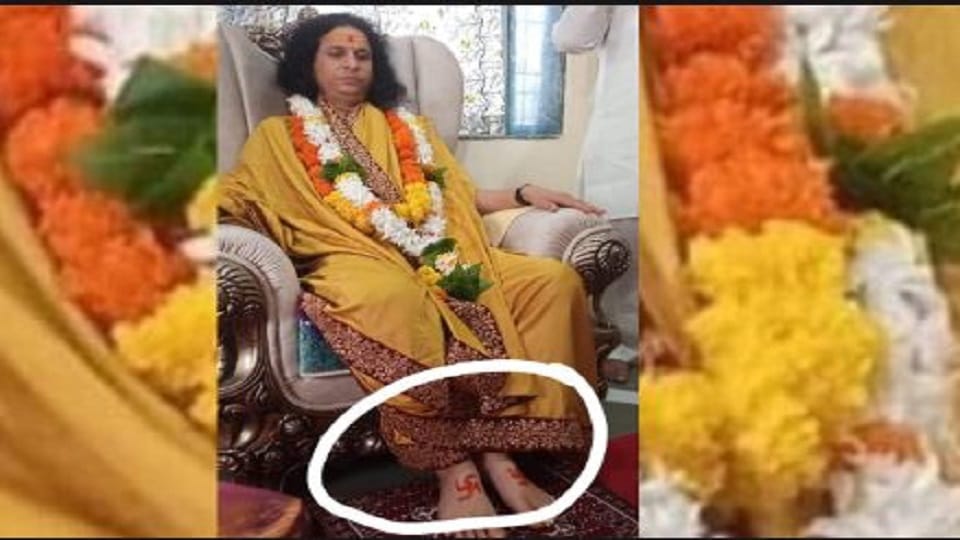 Controversy over Bhagwatacharya Indradevashvaranand people furious after seeing swastika signs on their feet