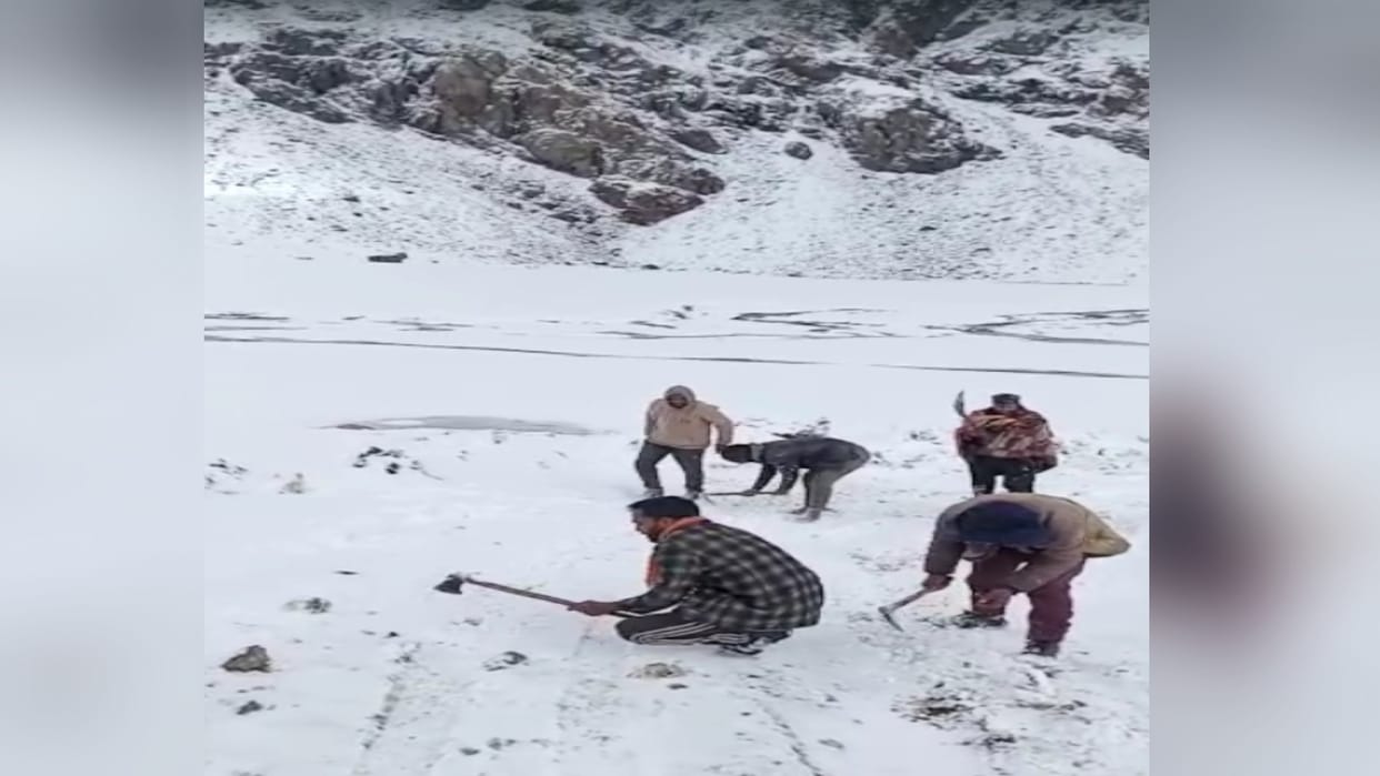 Path made by cutting snow with axe, spade, sledge
