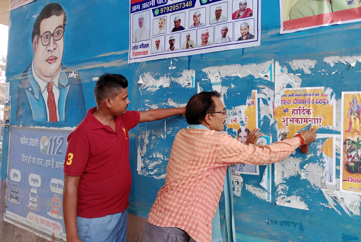 The process of removing the poster started at the crossroads