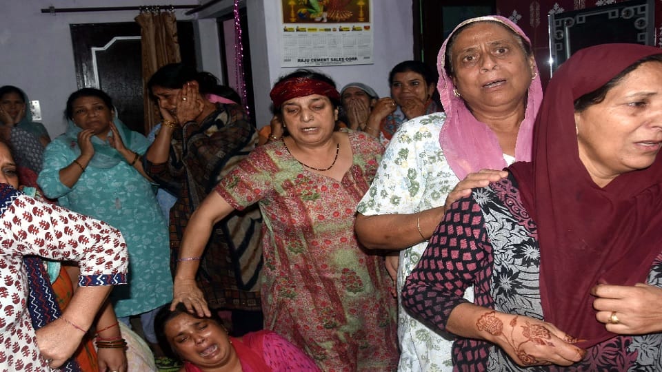 Kashmiri Pandit workers protest against the government after Puran Bhatt target killing