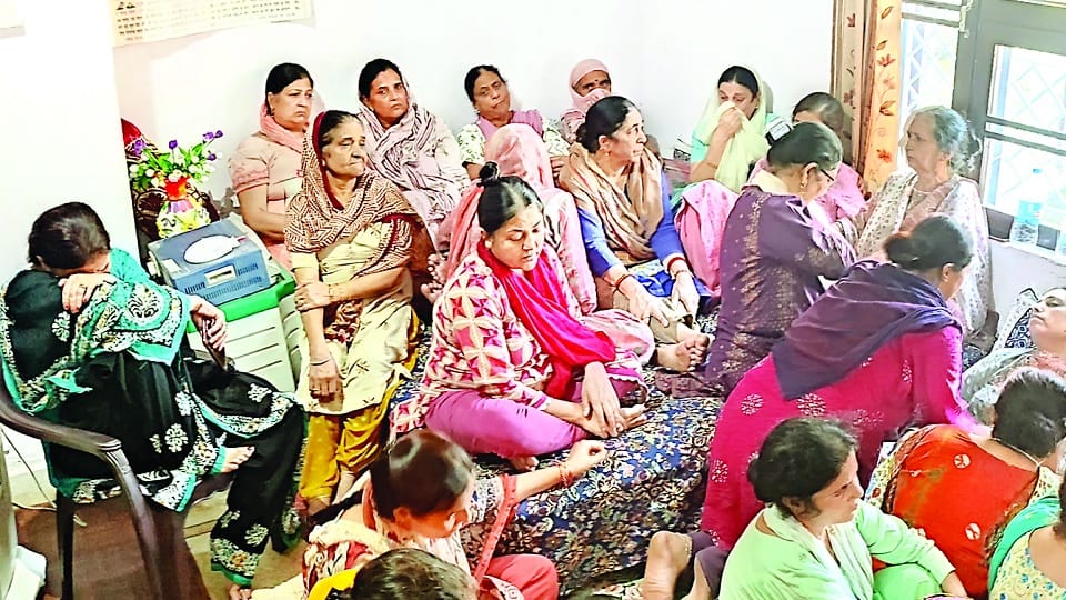 Kashmiri Pandit workers protest against the government after Puran Bhatt target killing