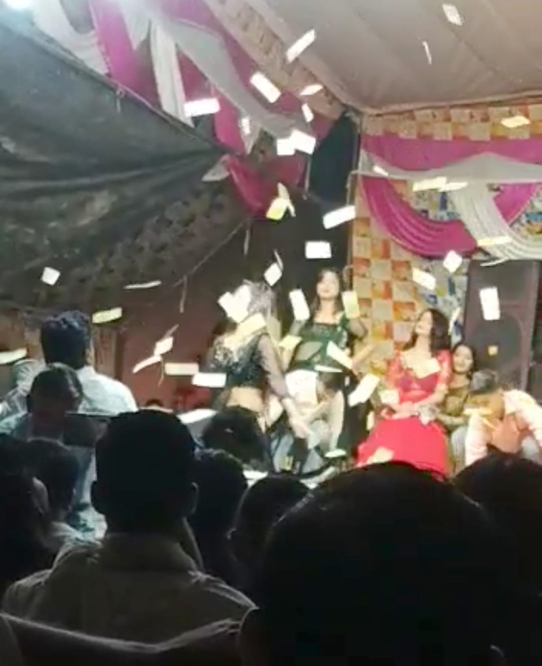 Notes blown on the dancers on the stage of Ramlila