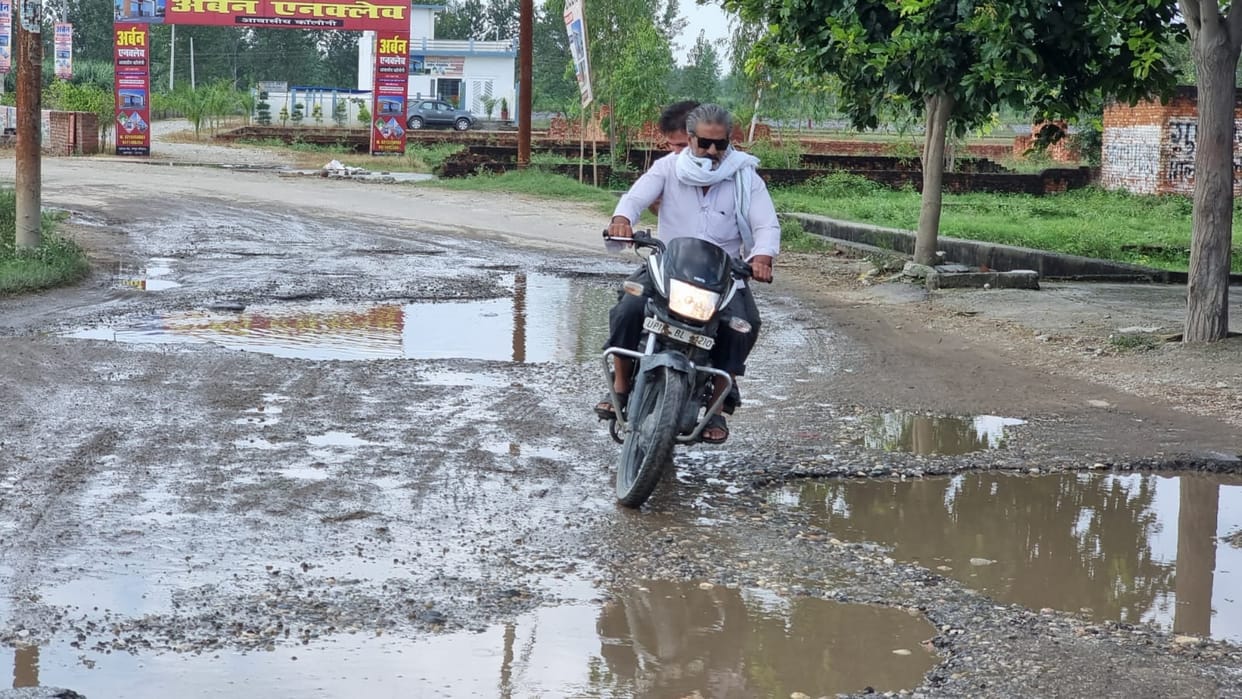 The potholes of the roads giving back pain