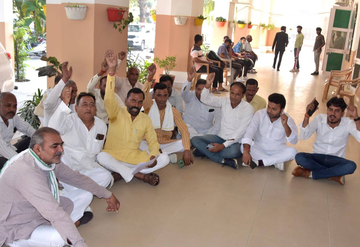 Villagers protest at DM office