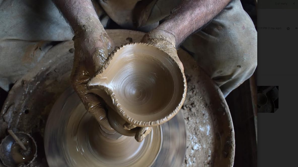 Kashmiri Muslim potter makes earthen lamps at his home workshop ahead of Diwali