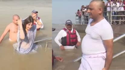 डिंपल यादव व अखिलेश यादव।