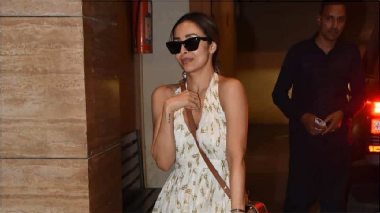 malaika arora in printed mini backless dress looks gorgeous