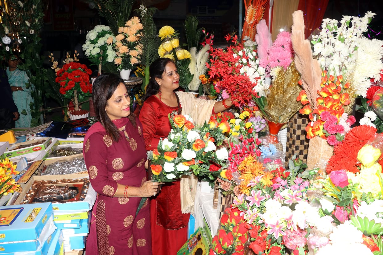 The market lit up with the light of Jhallar, Diyas