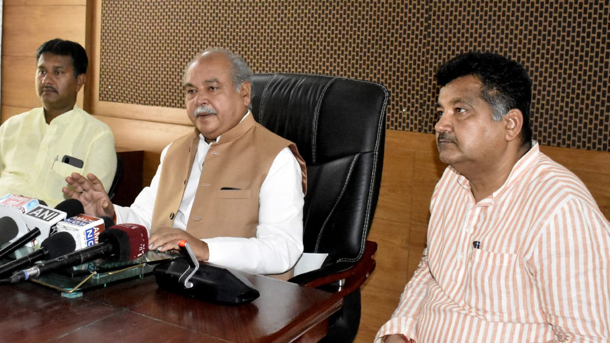 Agriculture Minister Tomar talking to reporters at Circuit House on Thursday.