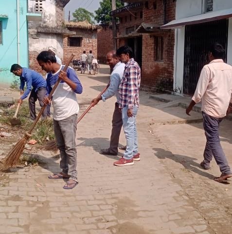cleaned villege and gave message of sanitation