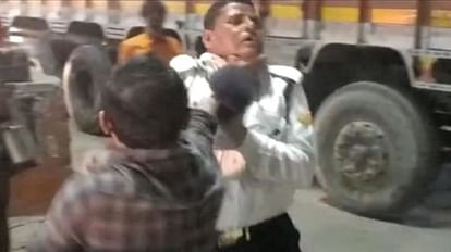 truck driver got angry beat up  traffic policeman on middle road in etah