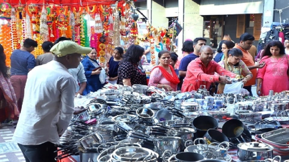 On Dhanteras crowd of buyers in markets shopkeepers so happy to with trade