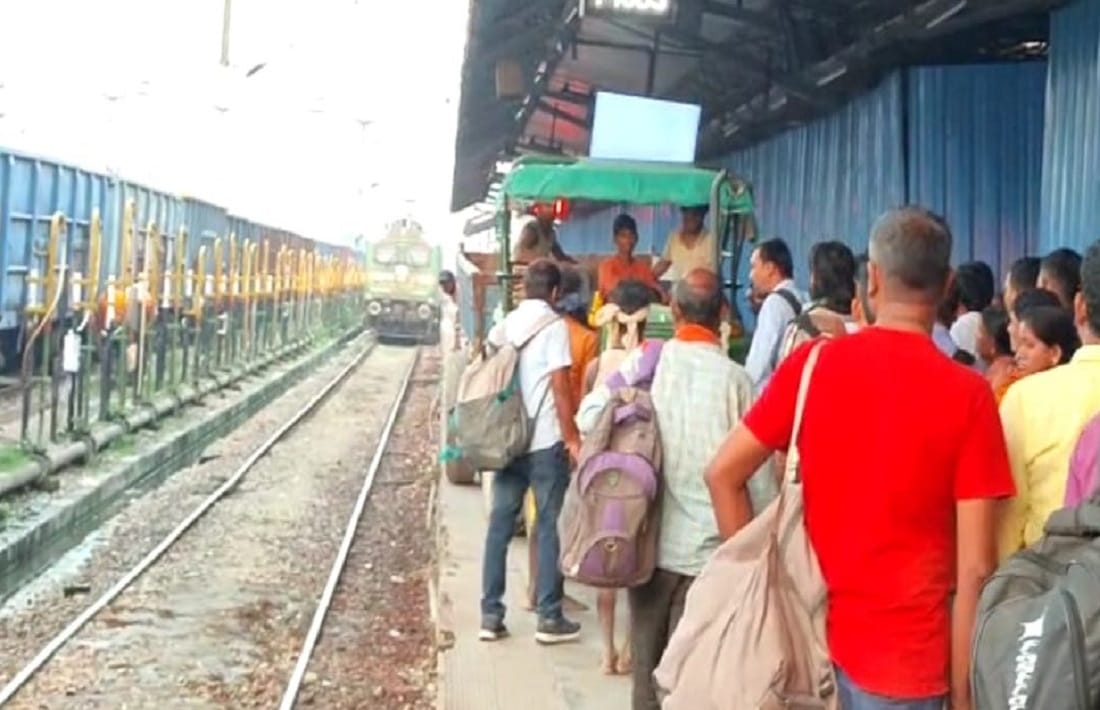 Passengers train and tractor together on platform of varanasi Cantt Junction