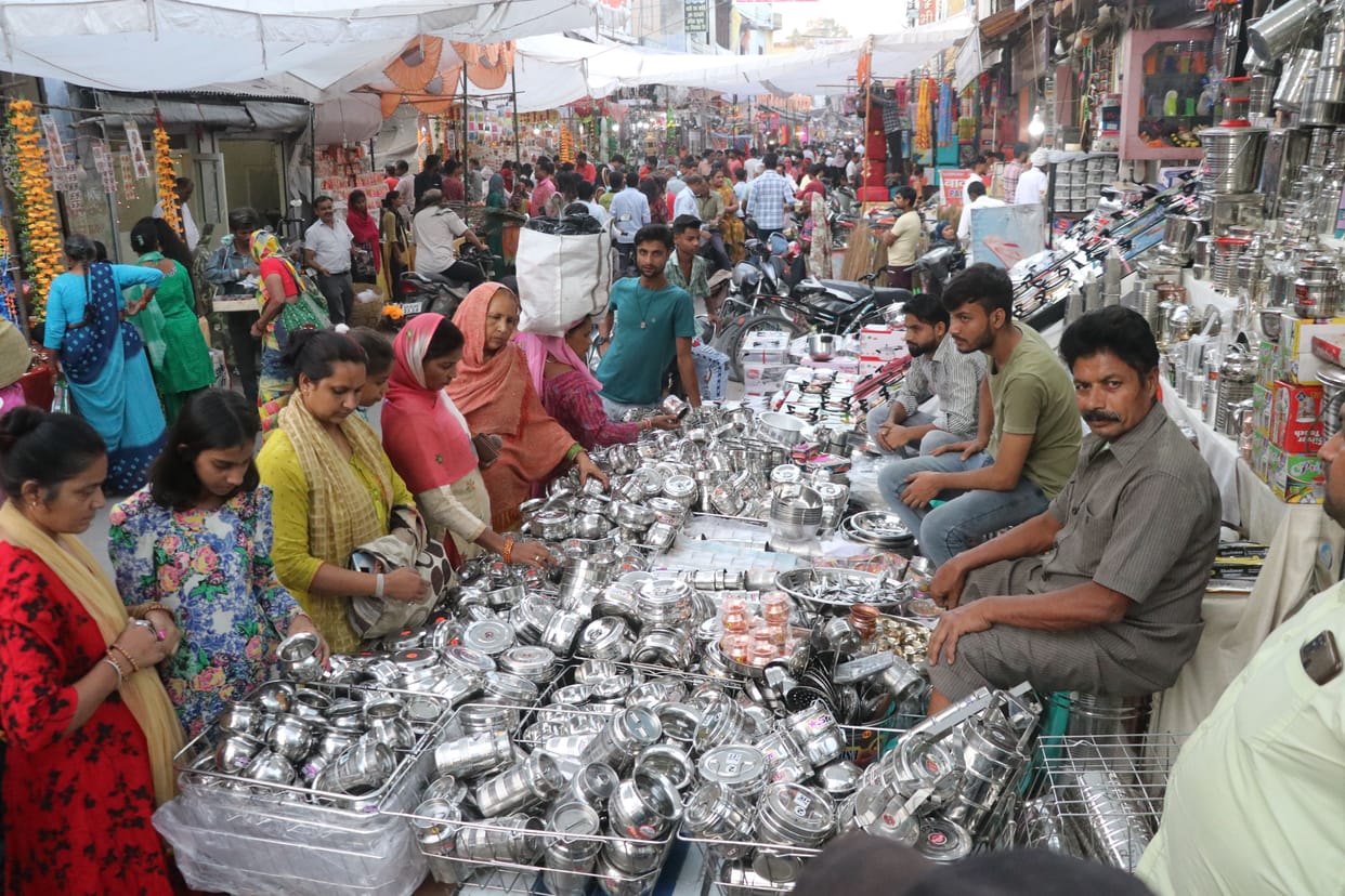 The market blossomed with the crowd of customers