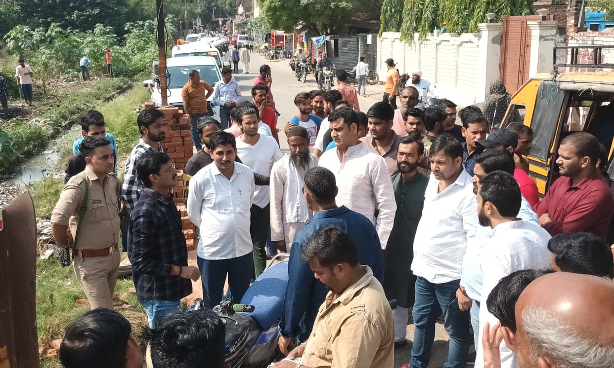 The staff of the District Panchayat reached the ground with JCB