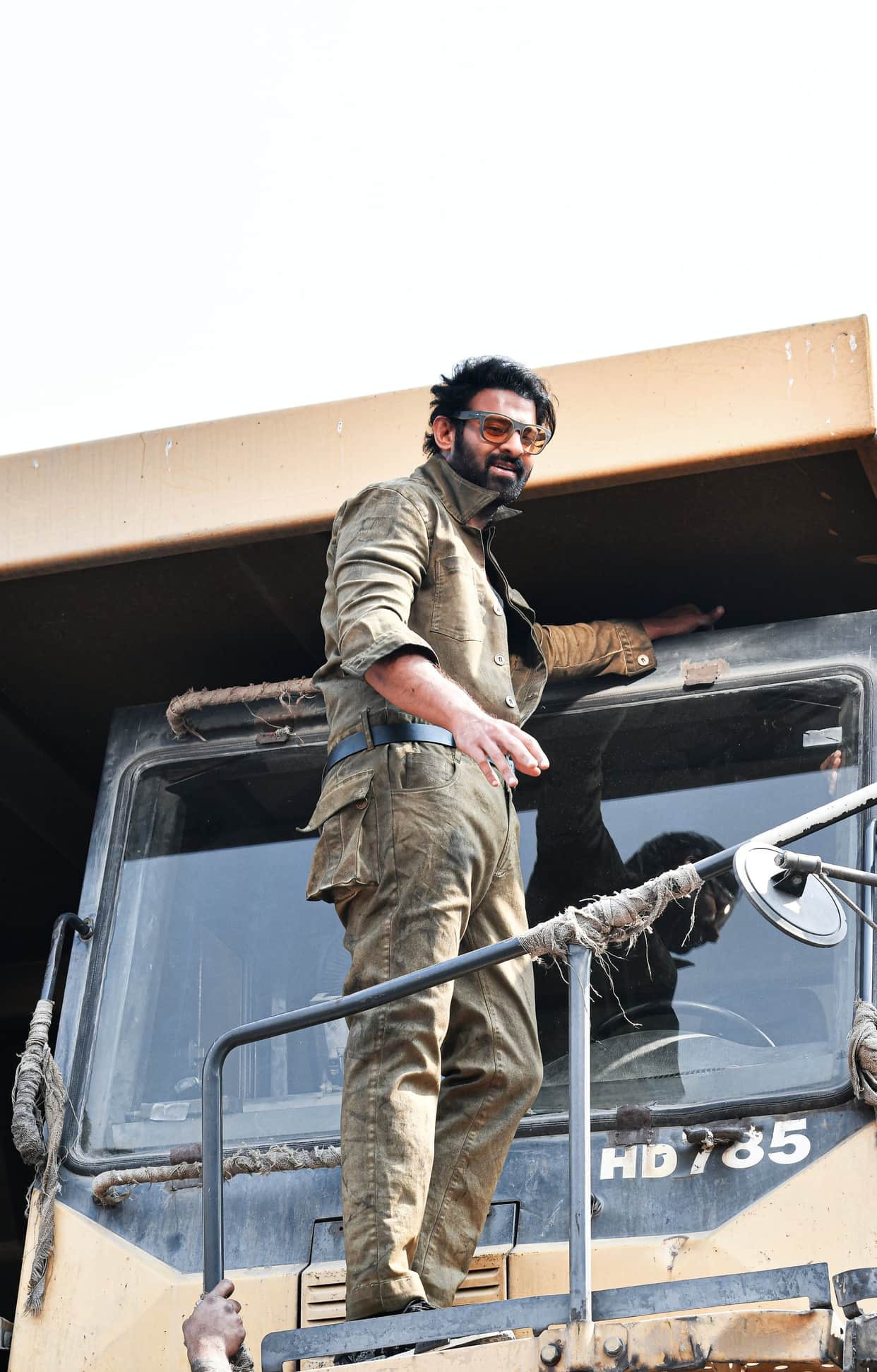 the makers of Salar released the first look of Prabhas from the film on his birthday