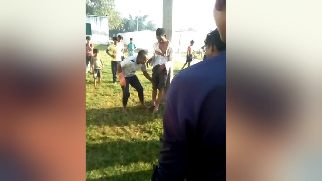 A retarded youth tied with a wire and beaten up on charges of mobile theft in Kushinagar