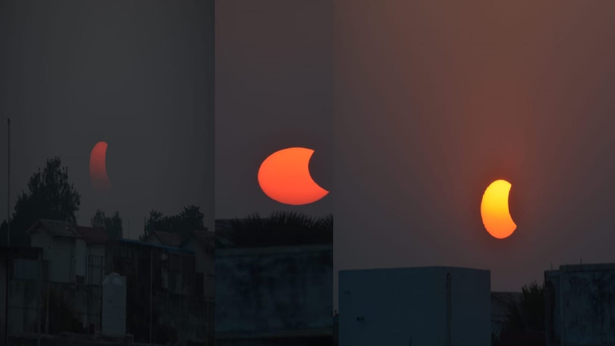 photos Surya grahan 2022 People of Varanasi witnessed the last solar eclipse of the year amazing pictures