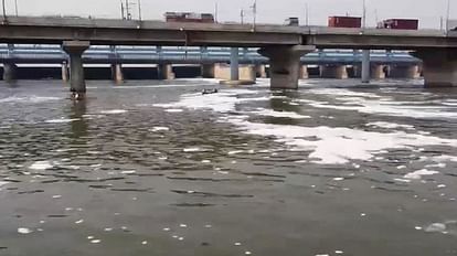 White poisonous foam flowing in Yamuna