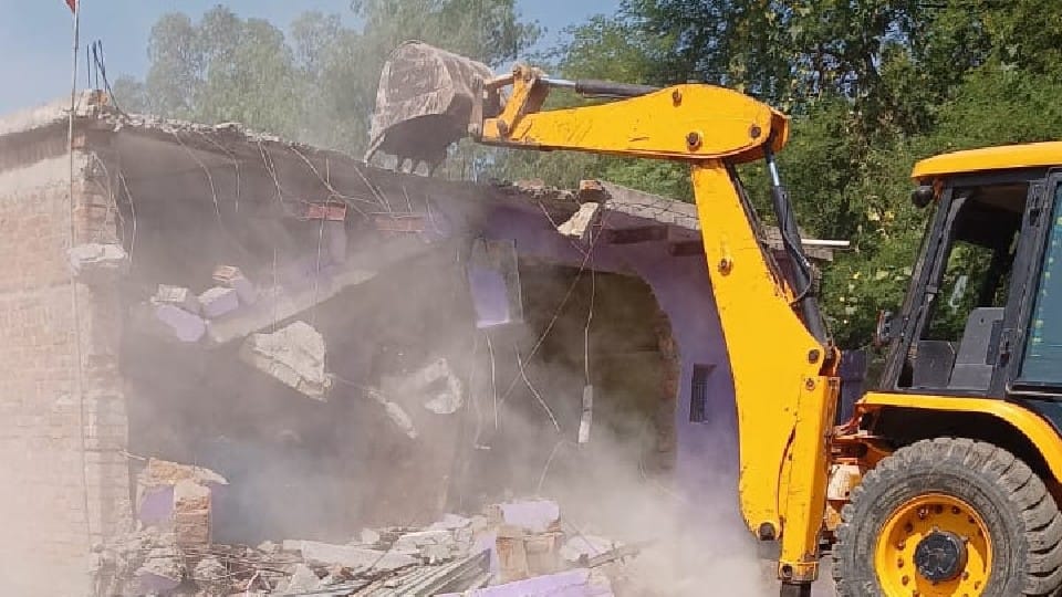 Bulldozers fired at the house and shop of the accused in the triple murder case