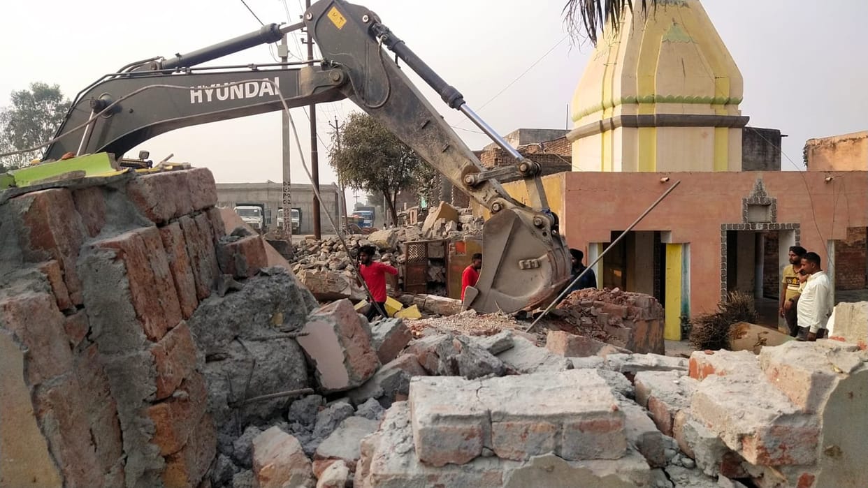 Demolition of other constructions including the gate of the religious place