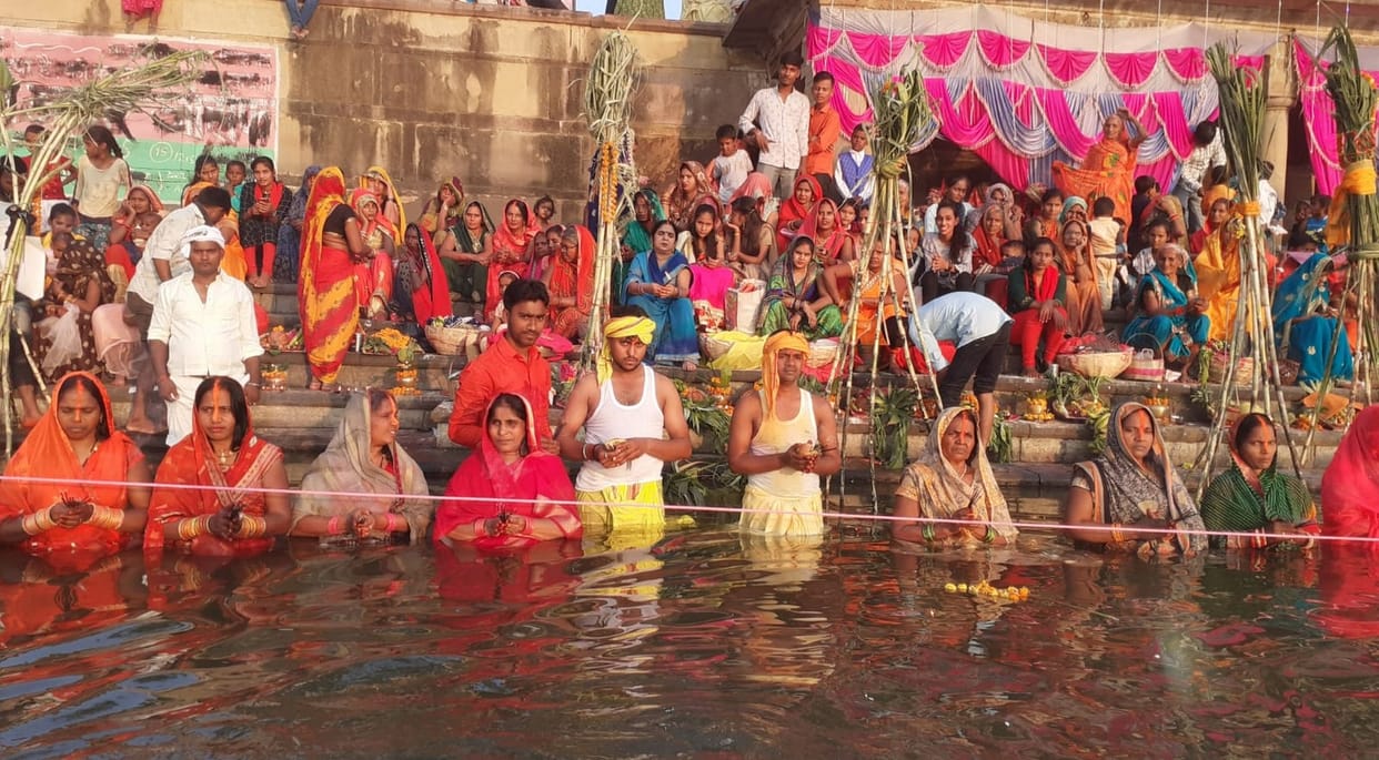 Seek happiness and prosperity by offering arghya to the setting sun