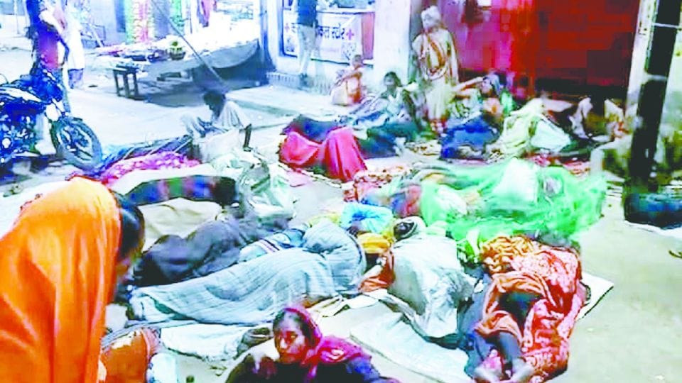 Water shower on devotees sleeping outside ashrams at night in Vrindavan
