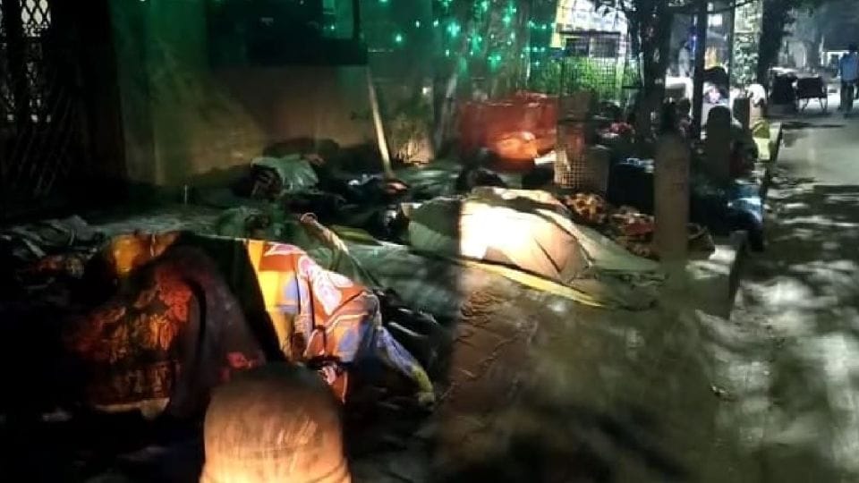 Water shower on devotees sleeping outside ashrams at night in Vrindavan