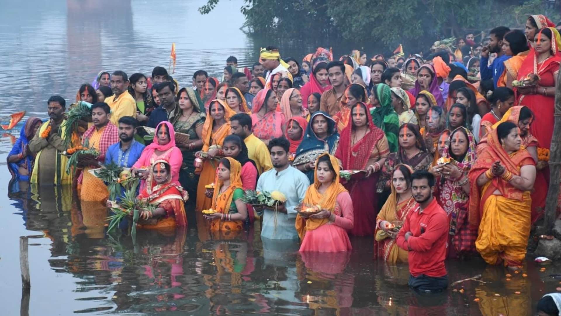 Women complete their fast of Chhath Puja on Monday morning.