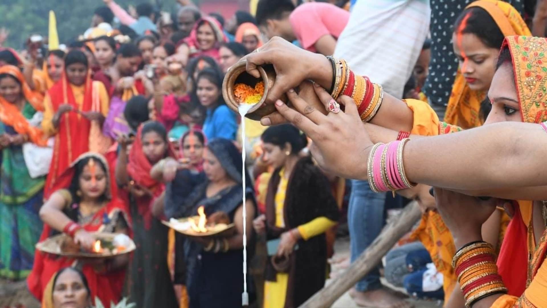 Women complete their fast of Chhath Puja on Monday morning.