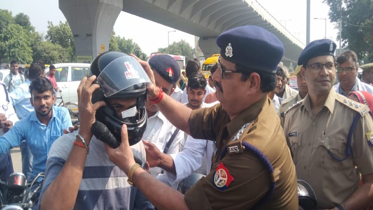 Inauguration of traffic awareness campaign: SP villager himself wore a helmet and somewhere administered oath