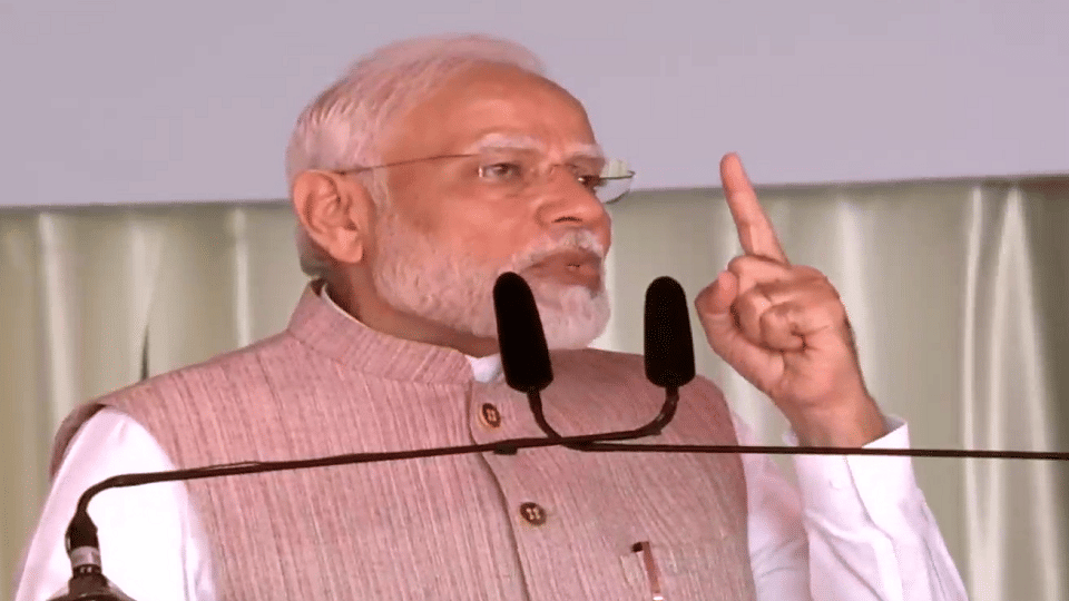 PM Modi targeted three state from Mangarh rally News in Hindi