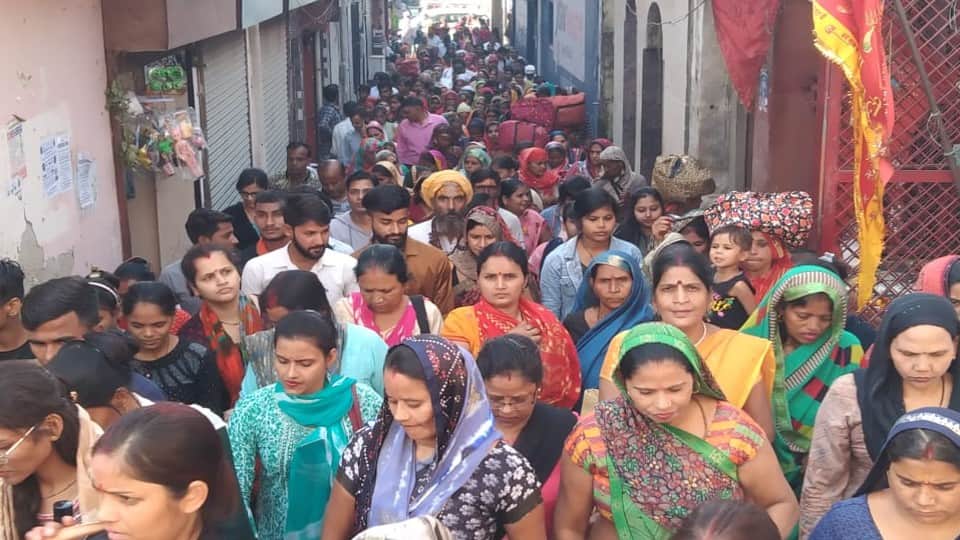 crowd of devotees gathered on the parikrama marg in Mathura on Akshaya Navami