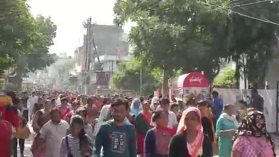 crowd of devotees gathered on the parikrama marg in Mathura on Akshaya Navami