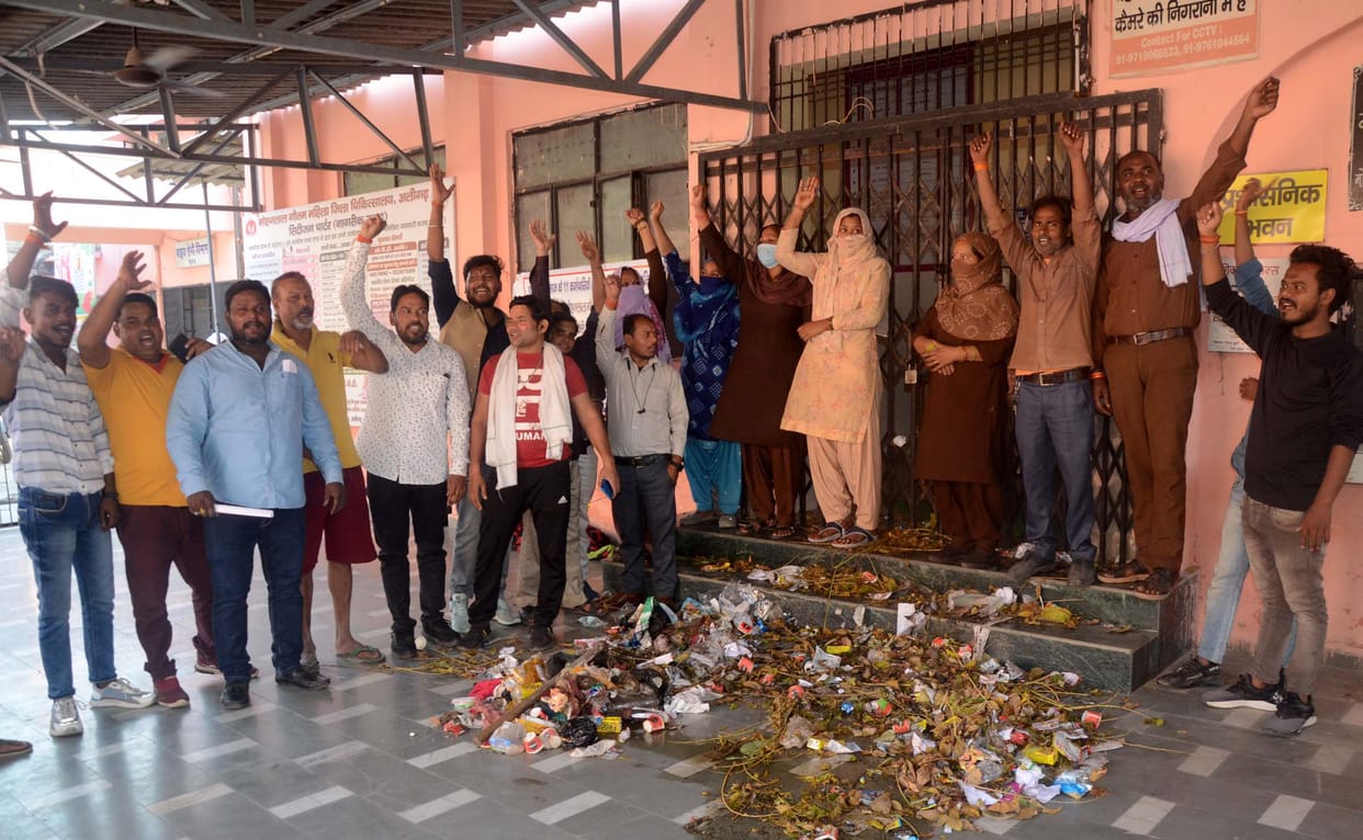 Garbage thrown in front of CMS office, locked