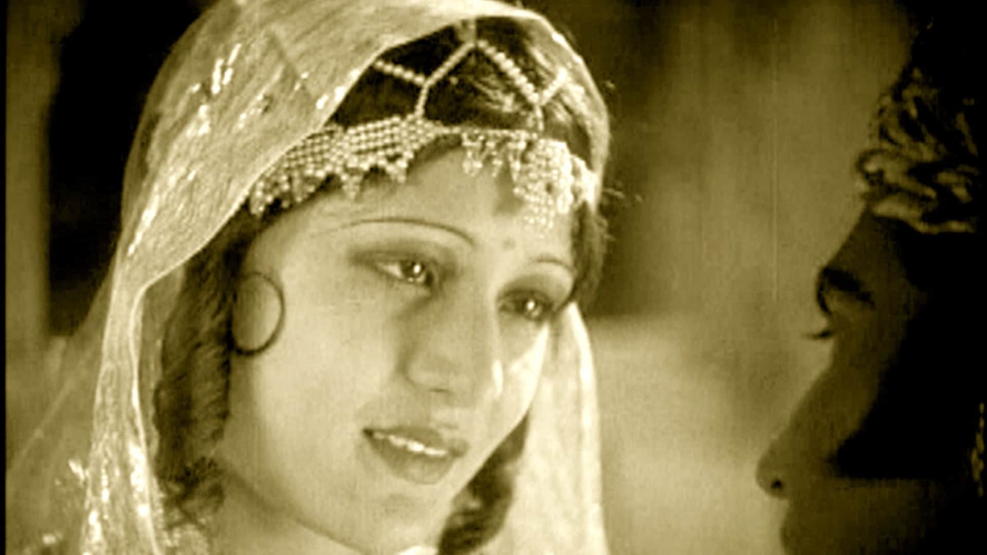 Bollywood First kiss was shot in British Rule in A Throw of Dice Movie by actress Seeta Devi in british rule