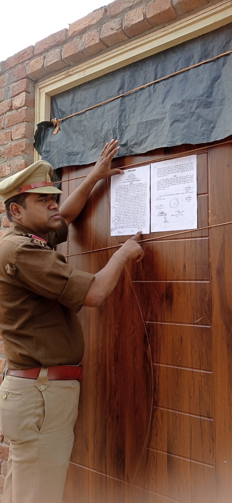 Police pasted notice at district Badar's house
