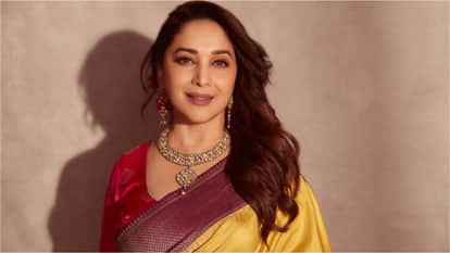 Madhuri Dixit at singer beyonce concert pose with husband doctor shriram madhav nene