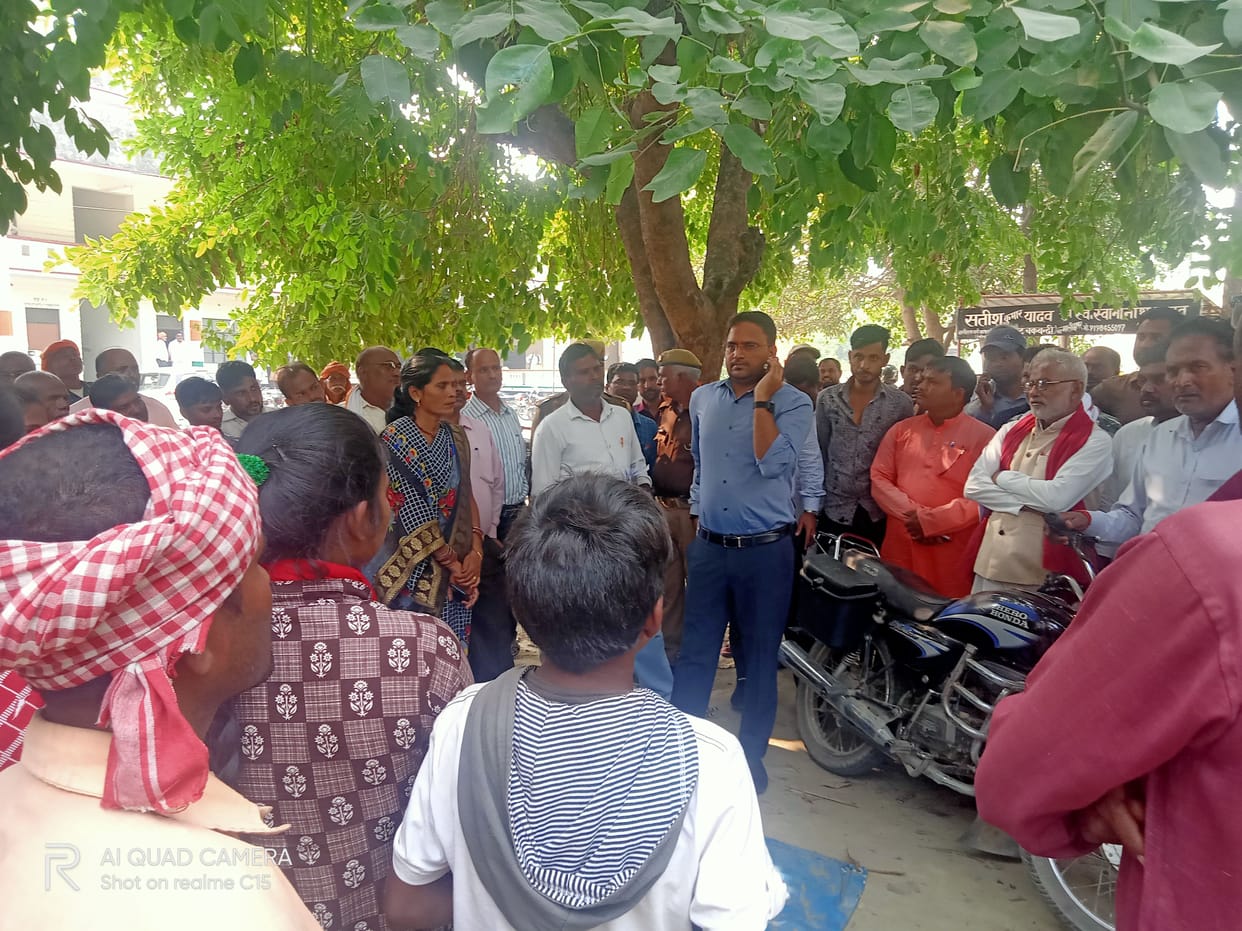 Lie in front of SDM's vehicle for land allotment