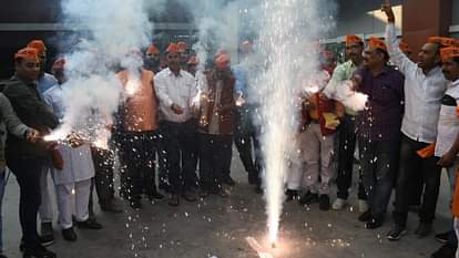 BJP activists celebrate win in bypoll election.