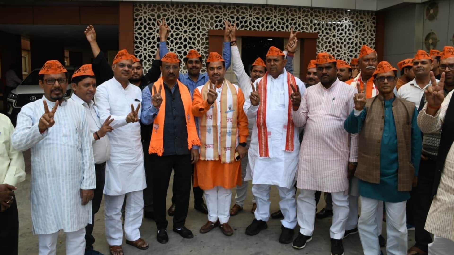 BJP activists celebrate win in bypoll election.