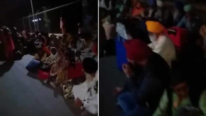 सड़क किनारे बैठे श्रद्धालु।